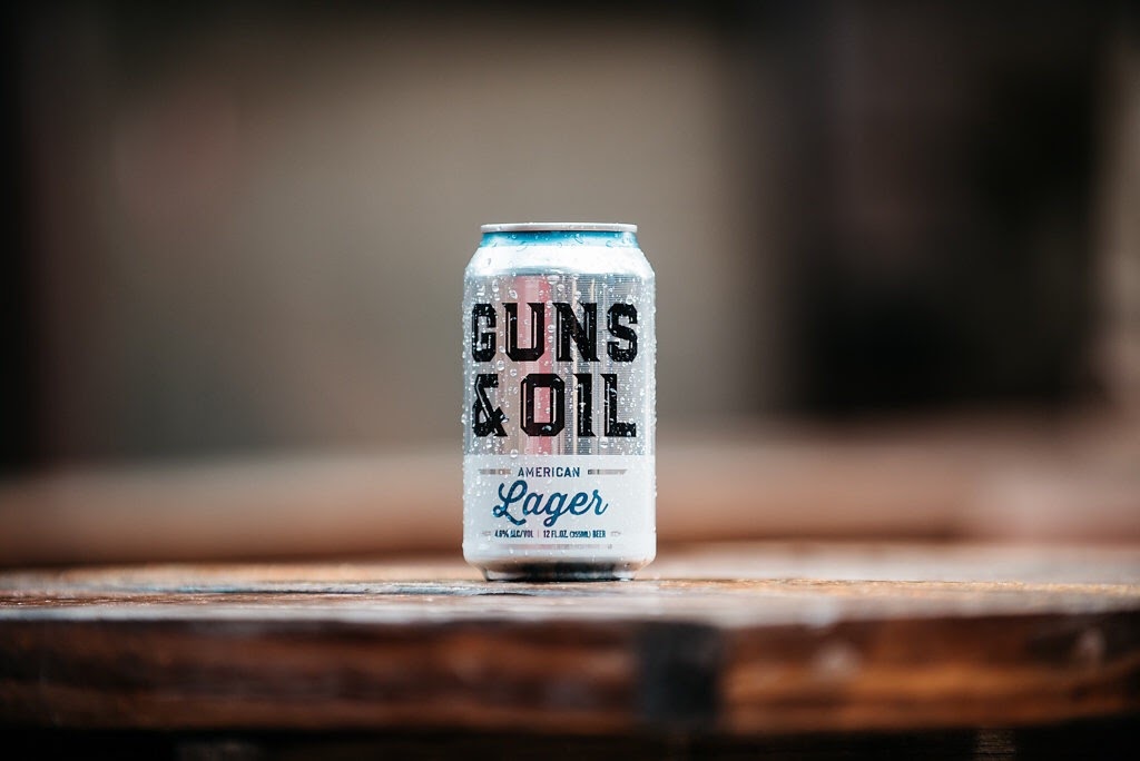 Guns & Oil Brewing Co. cans.